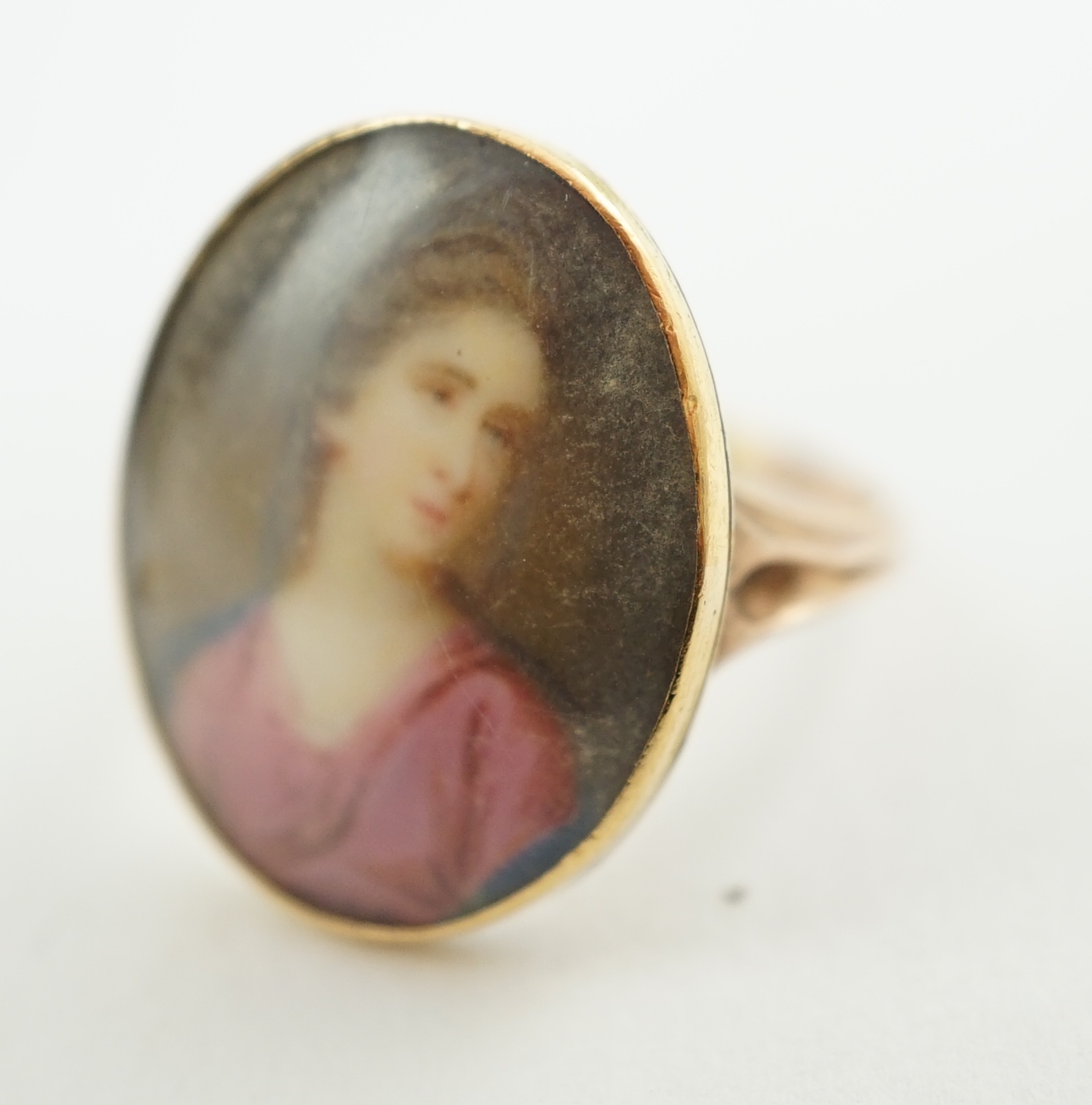 A George III gold memorial ring inset with an ivory miniature of a lady